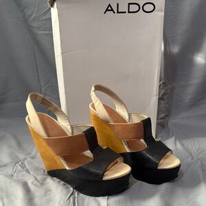 Aldo Black and Tan Wedge Sandals